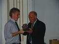 Tom rowlands winning an award